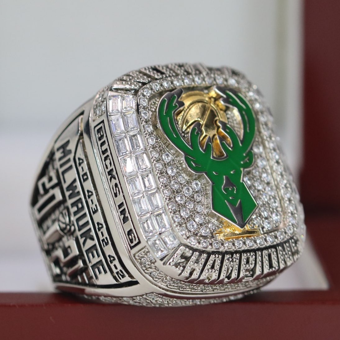Bucks receive championship rings, rout Nets in opener