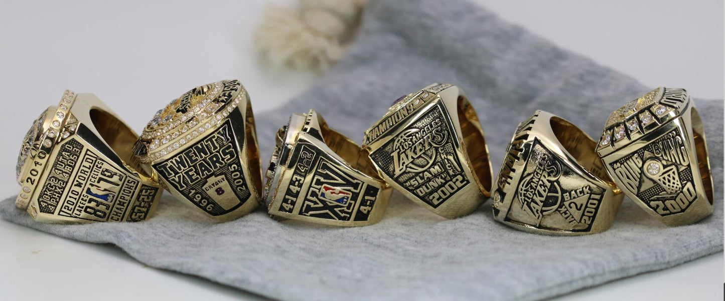 https://www.ringsforchamps.com/cdn/shop/products/special-edition-los-angeles-lakers-nba-championship-ring-6-ring-set-2000-2001-2002-2009-2010-kobe-premium-series-341098.jpg?v=1584681862&width=1445